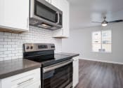 Thumbnail 28 of 67 - Eat-In Kitchen at Los Robles Apartments, Pasadena