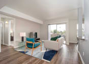 Thumbnail 37 of 67 - TV, Sofa In Living Room at Los Robles Apartments, Pasadena, CA, 91101