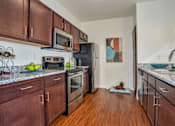 Thumbnail 4 of 23 - Large Kitchens with Stainless Steel Appliances at Apartment near UCHealth Longs Peak Hospital
