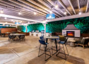 Thumbnail 6 of 21 - Outdoor grill and fireplace with seating at Aliso Creek, California