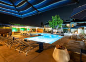 Thumbnail 4 of 21 - Outdoor pool area with lounge chairs at Aliso Creek, Aliso Viejo, CA, 92656