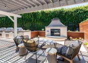 Thumbnail 11 of 21 - Outdoor fireplace and seating at Aliso Creek, Aliso Viejo, California