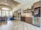 Thumbnail 31 of 36 - Clubroom with large windows at Montrachet Apartments, Napa