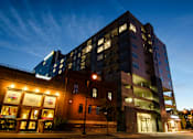 Thumbnail 42 of 45 - Nighttime Exterior of Arena Place Apartments