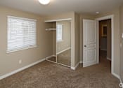Thumbnail 28 of 44 - Carpeted Bedroom at Commons at Avalon Park Apartments, Tigard, OR, 97224