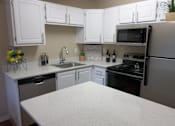 Thumbnail 10 of 31 - Kitchen at Commons at Hawthorn Village Apartments, Hillsboro, OR, 97124