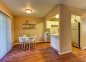 Thumbnail 13 of 31 - Living and dining at Commons at Hawthorn Village Apartments, Hillsboro