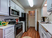 Thumbnail 5 of 27 - Fully Equipped Kitchen at Commons at Dawson Creek Apartments, Oregon, 97124