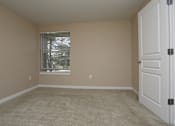Thumbnail 24 of 30 - Bedroom area with wooden floorat Commons at Creekside Apartments, Hillsboro, 97123