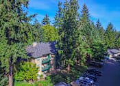 Thumbnail 9 of 30 - Building with trees at Commons at Creekside Apartments, Hillsboro, Oregon