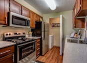 Thumbnail 12 of 30 - Kitchen at Commons at Creekside Apartments, Oregon, 97123