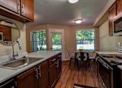 Thumbnail 14 of 30 - Kitchen area at Commons at Creekside Apartments, Hillsboro, OR, 97123