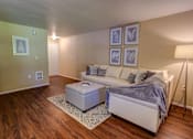 Thumbnail 15 of 30 - Living room with couch at Commons at Creekside Apartments, Hillsboro, OR
