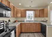 Thumbnail 25 of 51 - Large Wrap Around Kitchen Apartment | Rockledge Townhomes in Mechanicsburg | PMI |