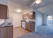 Thumbnail 23 of 29 - Kitchen with cabinets at VINE BY VINTAGE Apartments, California, 93436