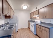 Thumbnail 24 of 29 - Kitchen with appliances at VINE BY VINTAGE Apartments, Lompoc, CA, 93436