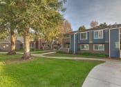 Thumbnail 10 of 29 - Lush Grounds and Pathways at VINE BY VINTAGE Apartments, California