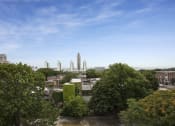 Thumbnail 13 of 13 - Aerial view of a city with mountains at Willett Apartments, Albany, NY, 12210