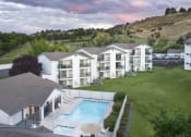 Thumbnail 2 of 14 - Westridge Apartments for rent in Clarkston, WA aerial view of buildings and pool