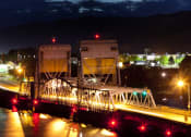 Thumbnail 8 of 14 - Westridge Apartments for rent in Clarkston, WA night time on bridge