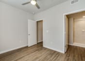 Thumbnail 55 of 65 - Wood Style Flooring in bedroom at Aviator at Brooks, San Antonio