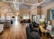 Thumbnail 10 of 65 - Clubhouse Area for Socializing at Aviator at Brooks Apartments, San Antonio, Texas
