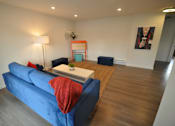 Thumbnail 9 of 14 - Staged Apartment Living Room