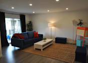 Thumbnail 10 of 14 - Staged Apartment Living Room