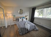 Thumbnail 11 of 14 - Staged Apartment Bedroom