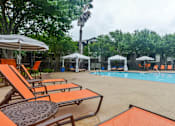 Thumbnail 20 of 24 - north austin apartments with lounge area near the swimming pool