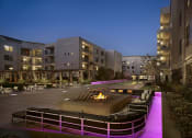 Thumbnail 10 of 14 - Outdoor Lounge Area With Fireplace at AVE Union, New Jersey