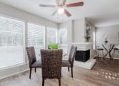 Thumbnail 3 of 13 - Corner fireplace to optimize furniture placement  at Country Square, Texas
