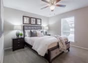 Thumbnail 7 of 13 - Spacious bedroom with ceiling fan  at Country Square, Carrollton, Texas