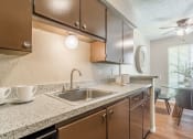 Thumbnail 2 of 13 - Fully equipped kitchen  at Forest Glen, Garland, TX, 75042
