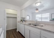 Thumbnail 8 of 15 - Stainless steel double sink in open kitchen  at Garden Gate, Irving, 75061