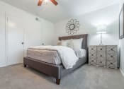 Thumbnail 11 of 15 - Large bedroom with walk-in closet  at Garden Gate, Irving, TX
