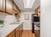 Thumbnail 3 of 15 - Fully Furnished Kitchen at Parkwood, Irving, 75061