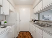 Thumbnail 6 of 30 - Fully Furnished Kitchen  at Plaza DeVille, Texas, 78240