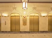 Thumbnail 2 of 39 - Resident Lobby with elevators at The Equitable Building, Des Moines
