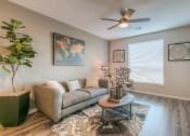 Thumbnail 29 of 78 - living room with couch and coffee table  at EdgeWater at City Center, Lenexa, KS