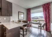 Thumbnail 61 of 84 - Kitchen With Dining at The Royale at CityPlace, Overland Park, 66210