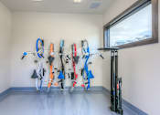Thumbnail 34 of 53 - a bike rack hanging on the wall in the community bike room  at Waterside Residences on Quivira, Lenexa, KS, 66215