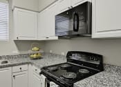 Thumbnail 12 of 19 - Kitchen Counter and Applicances