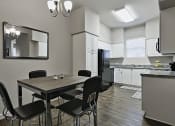 Thumbnail 11 of 19 - Kitchen and Dining Area