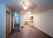 Thumbnail 5 of 15 - Kitchen And Hallway at Lorence Court Apartments, Portland, OR, 97216
