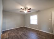 Thumbnail 5 of 28 - Unfurnished apartment with ceiling fan and light at Barrington Estates Apartments, Indianapolis, IN