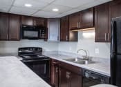Thumbnail 13 of 28 - Luxurious Kitchen at Barrington Estates Apartments, Indiana