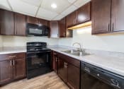 Thumbnail 14 of 28 - Fully Equipped Kitchen at Barrington Estates Apartments, Indianapolis, IN, 46260