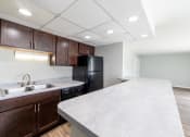 Thumbnail 15 of 28 - Modern Kitchen at Barrington Estates Apartments, Indiana, 46260