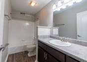 Thumbnail 22 of 28 - Stone countertop in bathroom at Barrington Estates Apartments, Indianapolis, Indiana